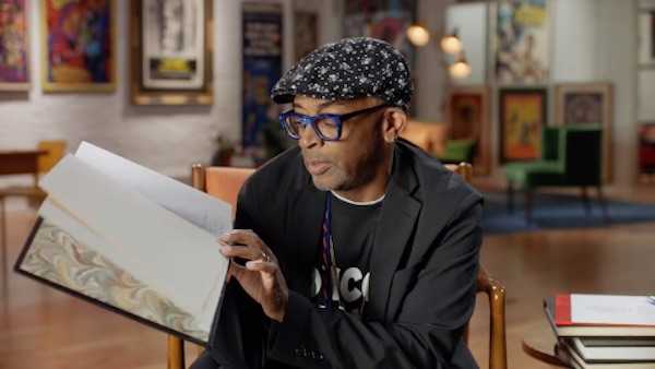 A picture of Spike Lee reading