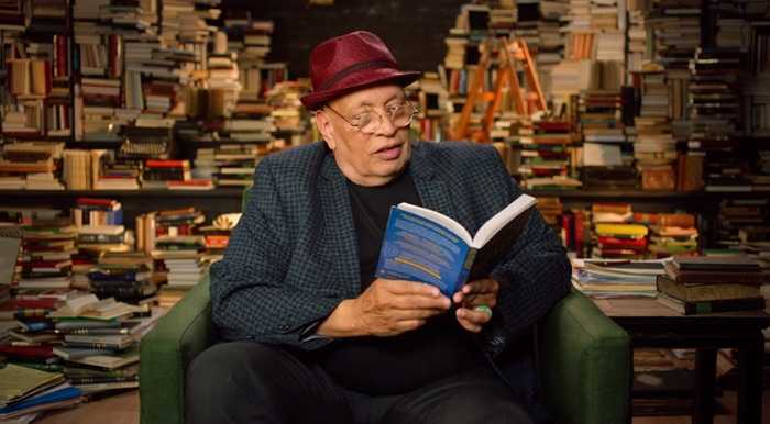 Walter Mosley reading a book