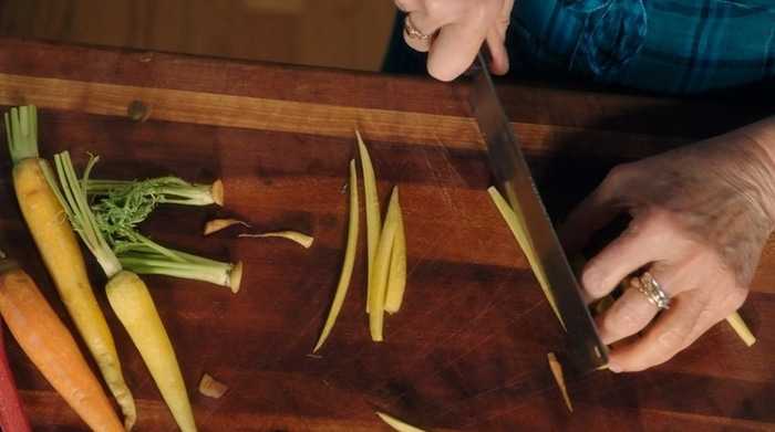 Alice Waters chopping vegetables