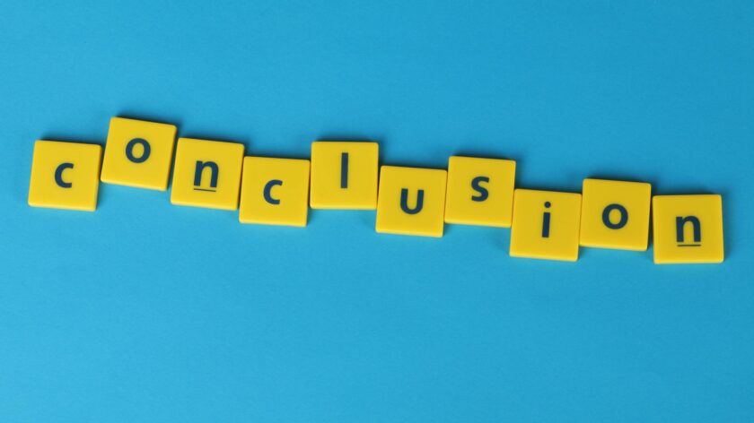 Yellow letter tiles spelling 'conclusion' on a vibrant blue background emphasizing creativity and achievement.